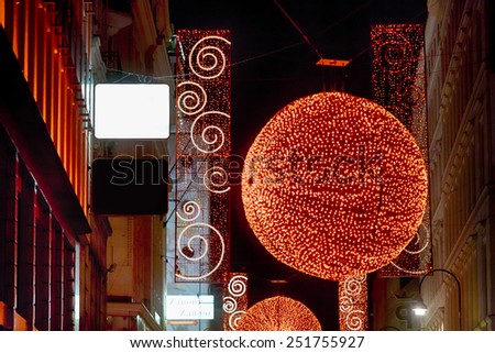 Vienna, Austria, January 07 2014: Christmas red light balls at night on a Rotenturmstrasse, Vienna, Austria