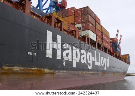 VALPARAISO, CHILE - OCTOBER 19, 2013: Side of the cargo ship loaded with containers on October 19, 2013 in Valparaiso, Chile.