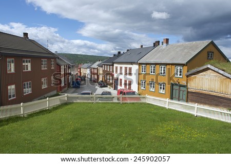 ROROS, NORWAY - JUNE 24, 2013: Exterior of the traditional houses of the copper mines town of Roros on JUNE 24, 2013 in Roros, Norway. Roros town is declared a UNESCO World Heritage site.