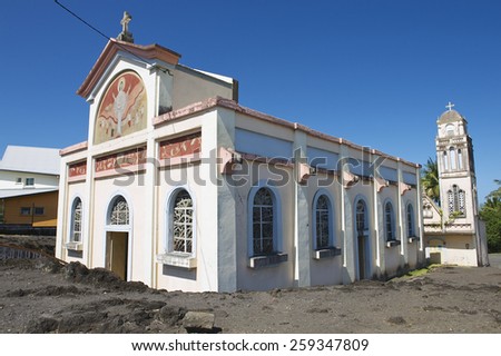 SAINTE-ROSE DE LA REUNION, FRANCE - DECEMBER 06, 2010: Exterior of the Notre dame des laves church. Church miraculously survived red-hot lava during volcanic eruption in 1977.