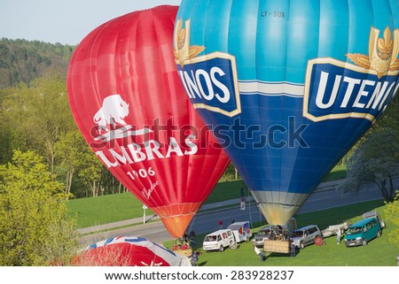 VILNIUS, LITHUANIA - APRIL 30, 2015: Unidentified people prepare hot air balloons for the flight in Vilnius, Lithuania.