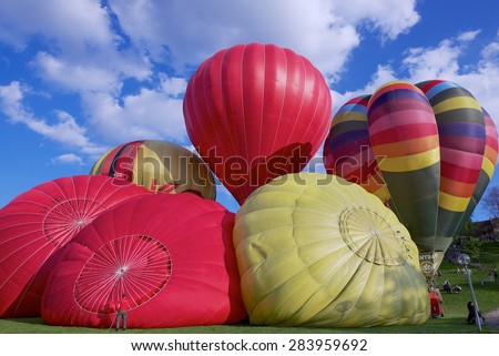 VILNIUS, LITHUANIA - MAY 05, 2015: Unidentified people start flight with the hot air balloons over Vilnius city, Lithuania.