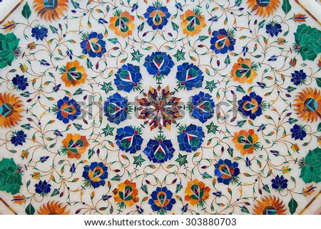 AGRA, INDIA - MARCH 28, 2007: Exterior of the traditional colorful floral marble design produced by local muslim Bharai community in Agra, India.