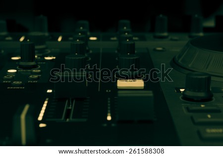 DJ mixer in a music studio, close up.