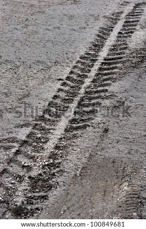 Prints of tire of heavy vehicle in mud