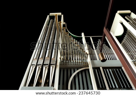 Low angle view of church organ on black