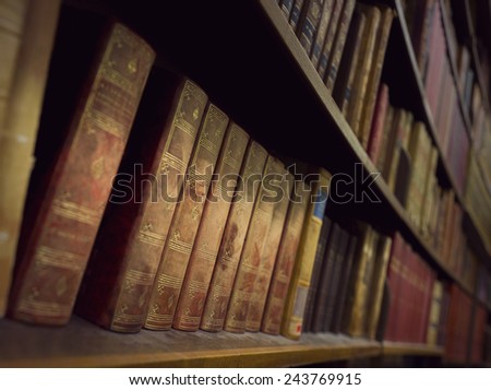 Vintage books in book case in library