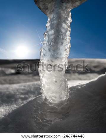 Ice formation formed from dripping water from rock in winter