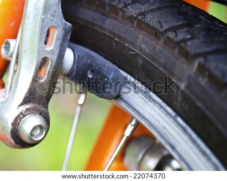 Close-up of a bicycle brake.
