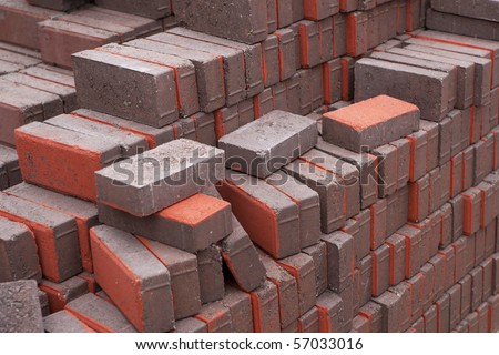 Pile of red and gray bricks