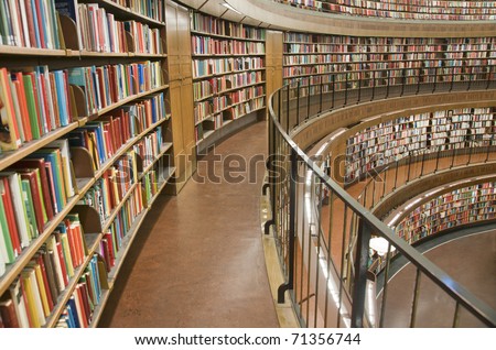Bookshelf in library with many books