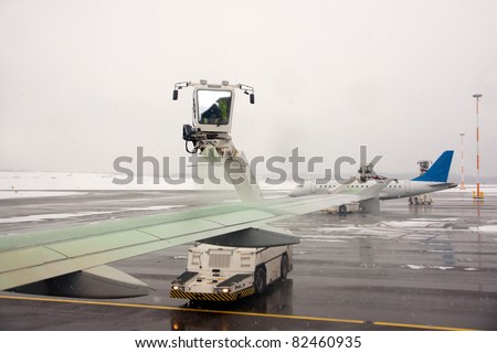 De-icing an aircraft before takeoff