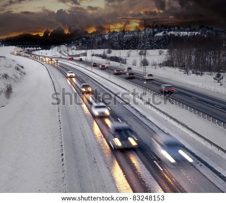 Busy road in winter evening