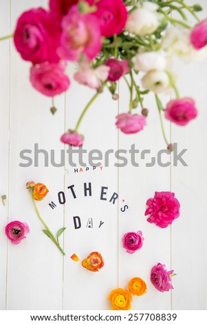 Happy Mothers Day Letters cut out from the Magazines and Flowers Ranunculus