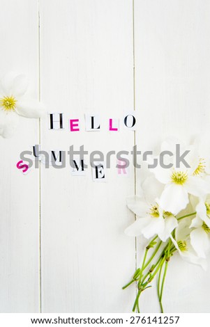 Hello Summer Letters cut out from the Magazine with  Clematis Flowers nearby