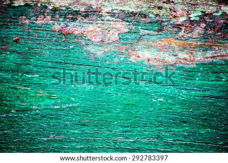 Painted Old Wooden Green Wall with sand on it. Background