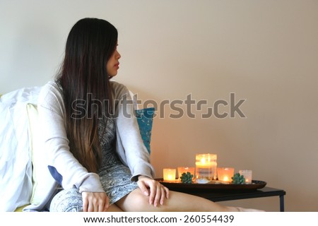 Asian girl with long hair, relaxing, looking left