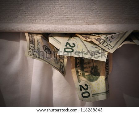 A secret stash of money is hiding under a mattress bed.