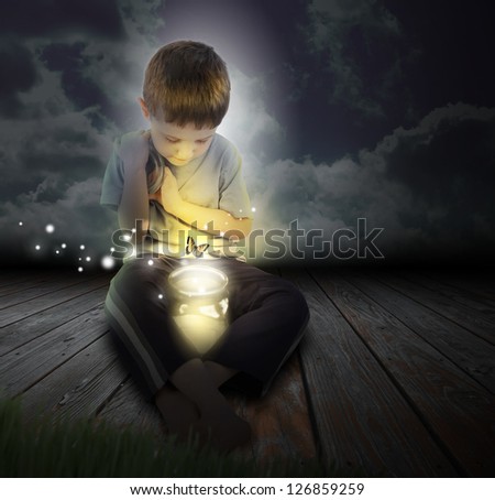 A boy is looking at a glowing bug firefly coming out of a jar with a butterfly at night for an imagination or hobby concept.