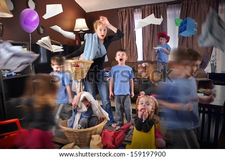 A Housewife Is Stressed And Tried Trying To Clean The House While Wild Children Are Running Around Making A Mess For A Discipline Or Parenting Concept.
