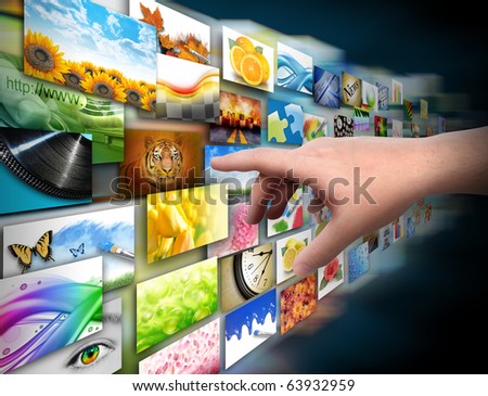 A hand is reaching out and touching a media gallery with photos on a black background.