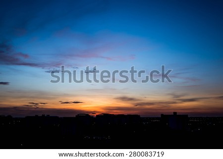 Silhouette rural town and sky in sunrise