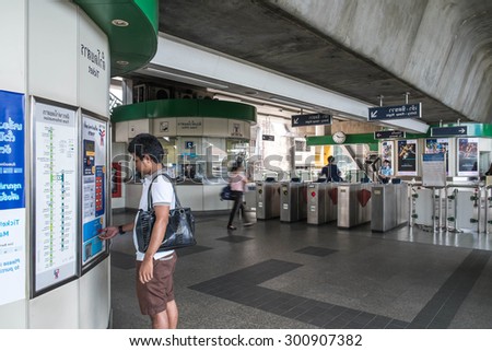 BANGKOK THAILAND - JULY 25 - Unidentified people using automatic ticket machine at BTS station on July 25, 2015 in Bangkok Thailand