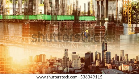 Double exposure, Bangkok city in sunset, with real estate site construction with workers
