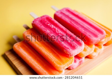 Ice cream stick on a colored background