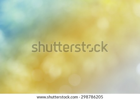 The abstract blue and yellow bokeh blurred background color, blurry background