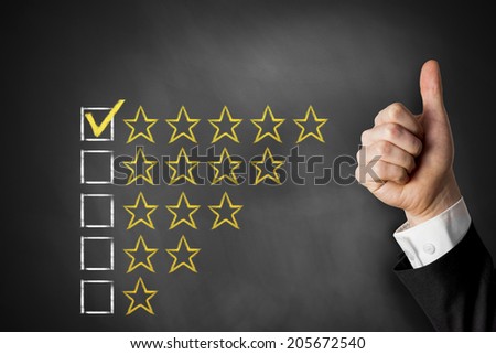 thumbs up golden rating stars checkbox on chalkboard