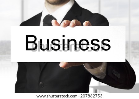 businessman holding sign business