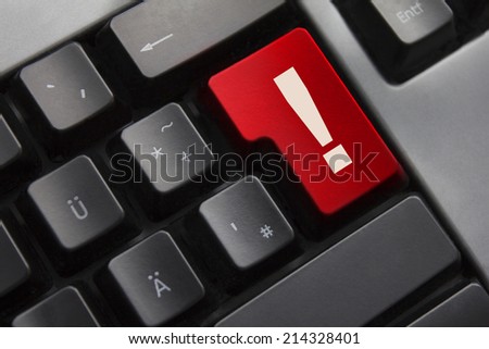 dark grey keyboard red button exclamation mark danger