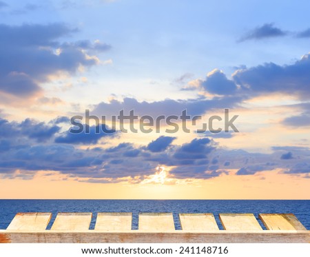 old wood table and tropical sea and pastel sky on background.Spring or summer abstract nature background.