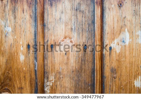Wood Background Texture. Rustic weathered barn wood background with knots and scratches