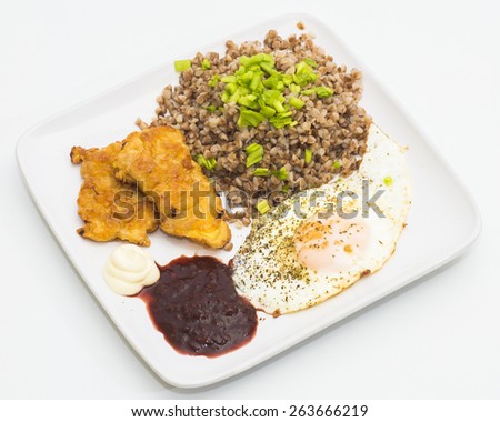 Boiled buckwheat with omelet, chicken steaks, white and  sour plum sauce