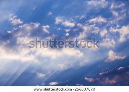 sunbeams and clouds , Beautiful blue sky with sunbeams and clouds. Sun rays.