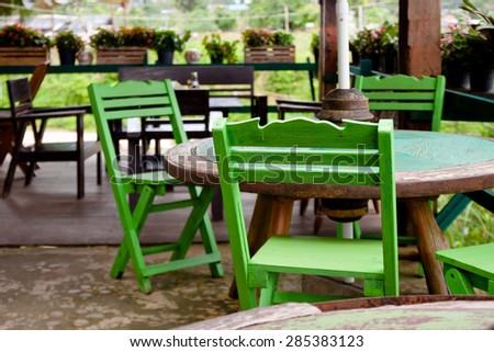 green vintage chair on coffee cafe