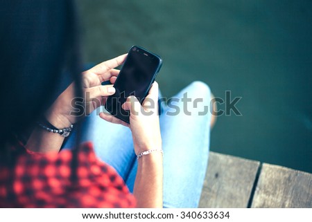 Close up woman using smart phone/Woman using smart phone