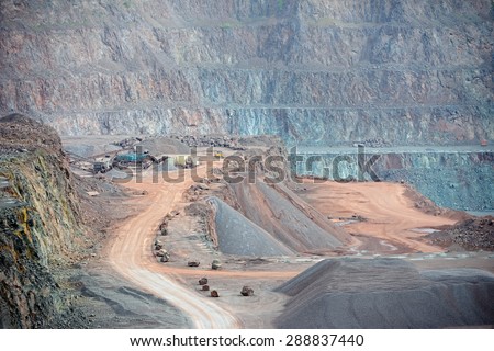 stone crusher machine in an open pit mine. mining industry