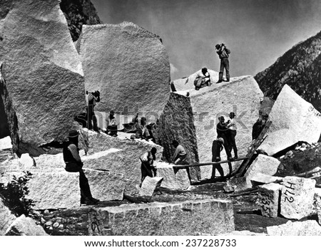 Men quarrying granite in Cottonwood Canyon for the Mormon Tabernacle The immense blocks fell down from the walls of the canyon are split by stone workers Photo by William Henry Jackson in 1872.