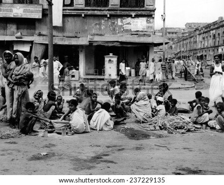 At the peak of India\'s famine in late October 1943 Starving homeless people huddle in a Calcutta street.
