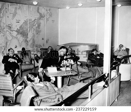 High life on the Hindenburg Passengers aboard the Hindenburg at ease in the salon as the dirigible flew over the mid-Atlantic en route to Lakehurst.