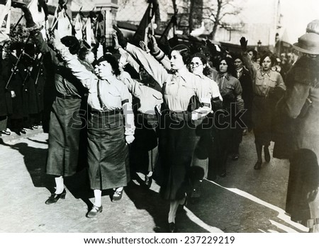 Girls from the Solidarite Francaise a right wing Royalist group observe first anniversary of 1934 fascist riot in Paris.