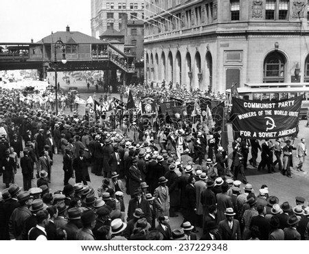 Reds gather for 1934 May Day parade to Union Square in New York City The procession is lead by a large banner reading \'Communist Party.