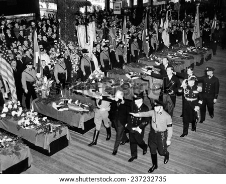 Germans honor victims of the Hindenburg disaster Funeral services were held on the pier of the North German Lloyd and Hamburg-American Steam lines for 23 victims of the May 6 1937 crash.