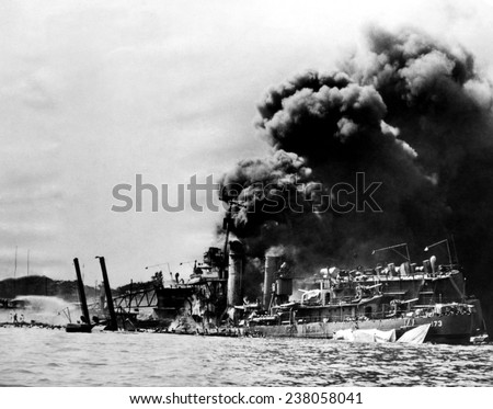The USS Shaw afire after a direct hit by a Japanese bomber, Pearl Harbor, December, 7, 1941.