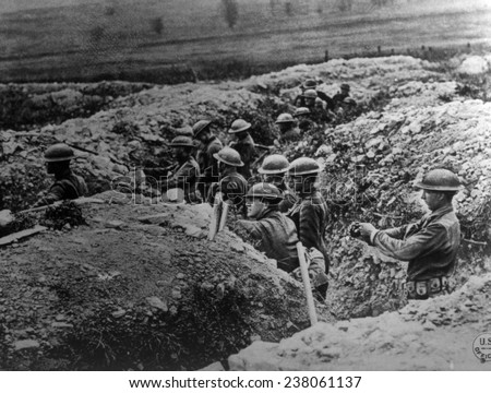World War I, American soldiers of the 132nd Infantry, 33rd Division, in a trench at Alexandre, Meuse, France, U.S. Signal Corps photograph, 1918.