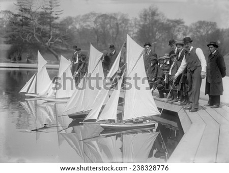 New York City, start of toy yacht race in Central Park, ca 1910s.