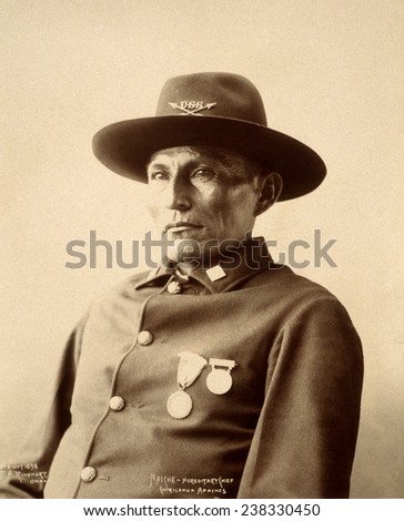 Wild West. Naiche, Chiricahua Apache chief, half-length portrait, facing left, dressed in a military uniform decorated with medals, Adolph F. Muhr, photographer, 1898.